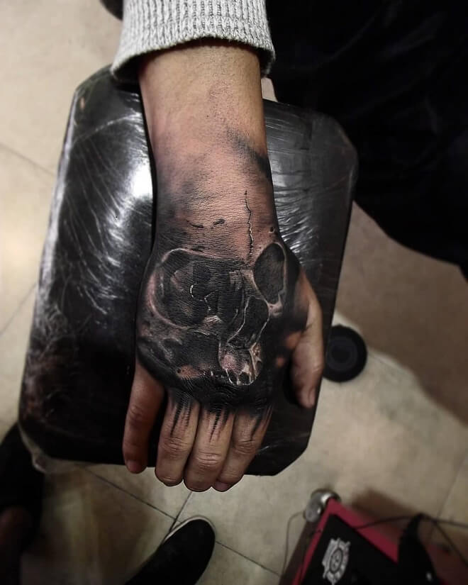 Amazing Hand Skull Tattoo