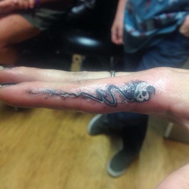 Awesome Skill Tattoo on a Finger