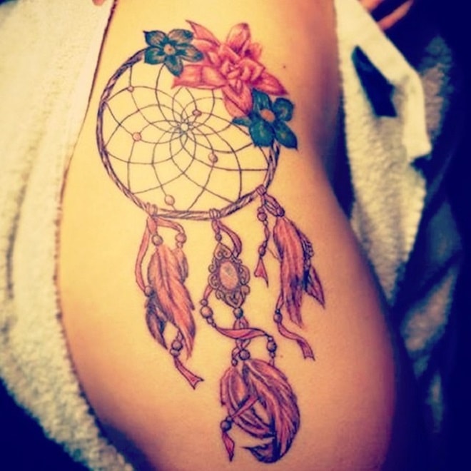 Dreamcatcher tattoo with flowers