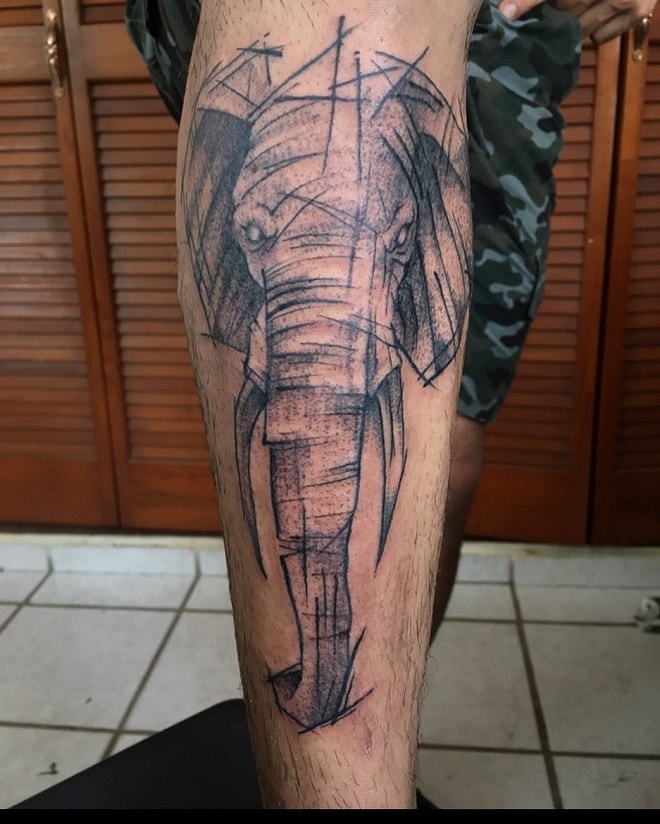 dynamic black elephant tattoo