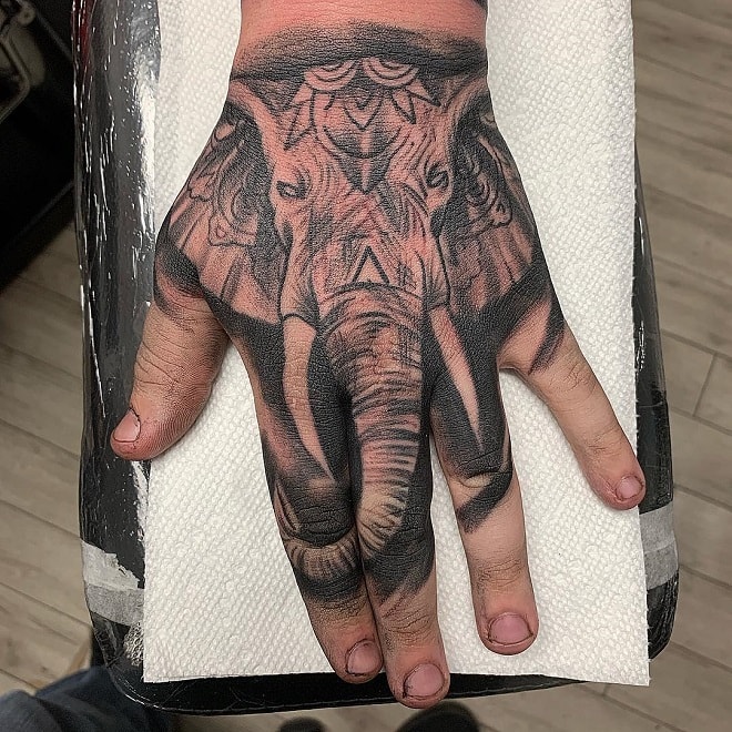 fingers elephant tattoo