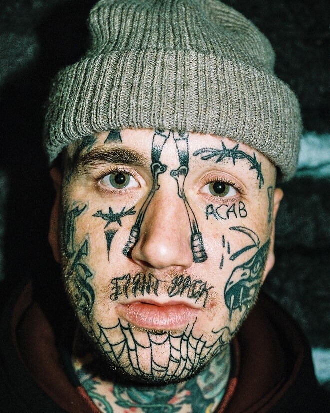 Analog Face Tattoo