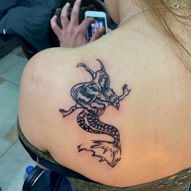 Back Side Capricorn Tattoo