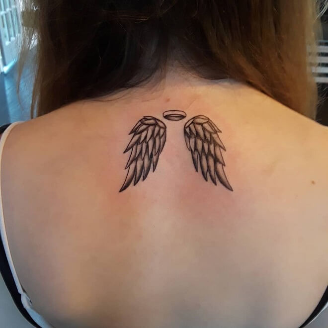 Black And Grey Angel Wings Tattoo