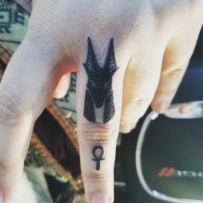 Finger Egyptian Tattoo