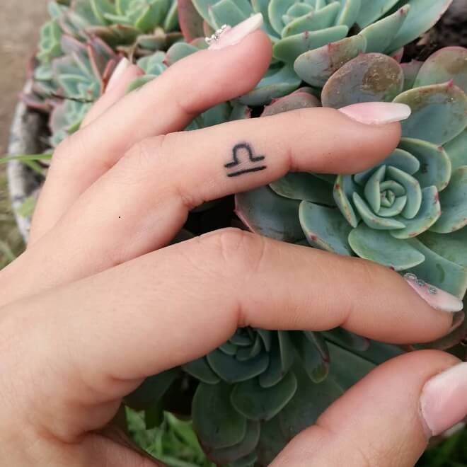 Finger Libra Tattoo