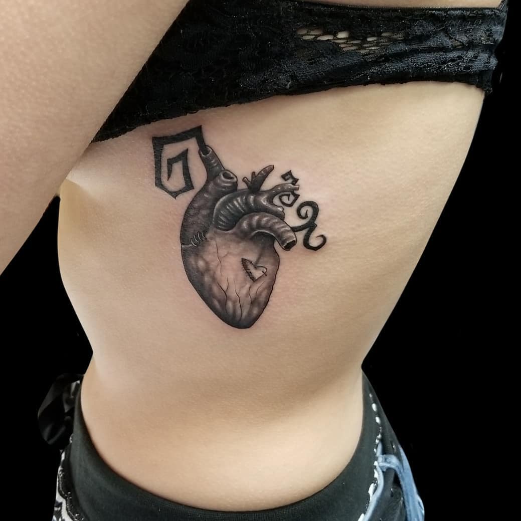 Heart Rib Cage Tattoos