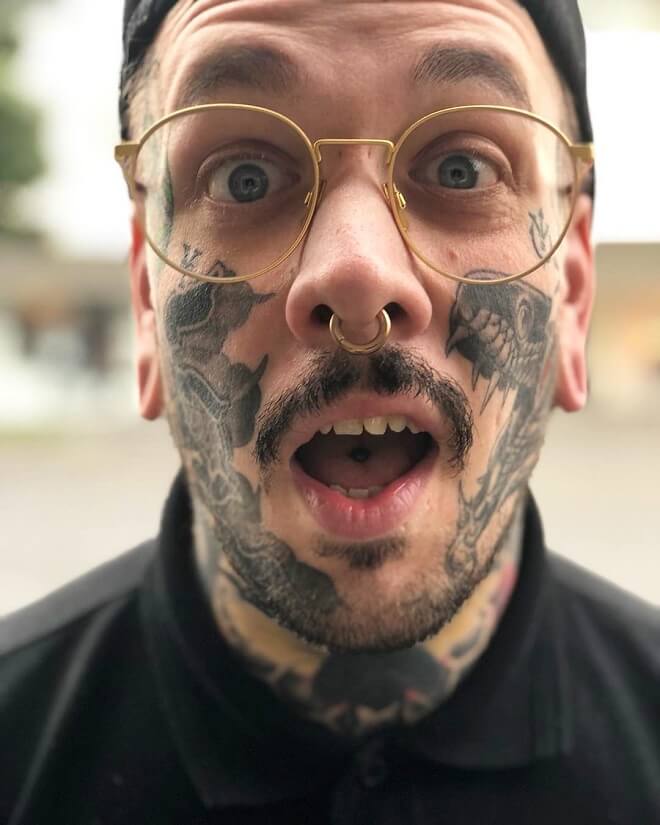 Muscle Face Tattoo