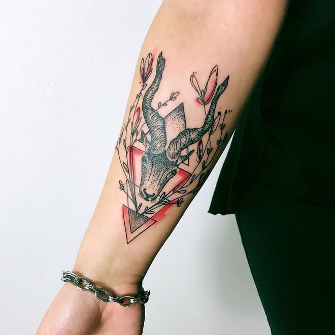 Red and Black Capricorn Tattoo