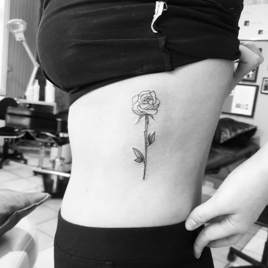Simple Rose Rib Cage Tattoo