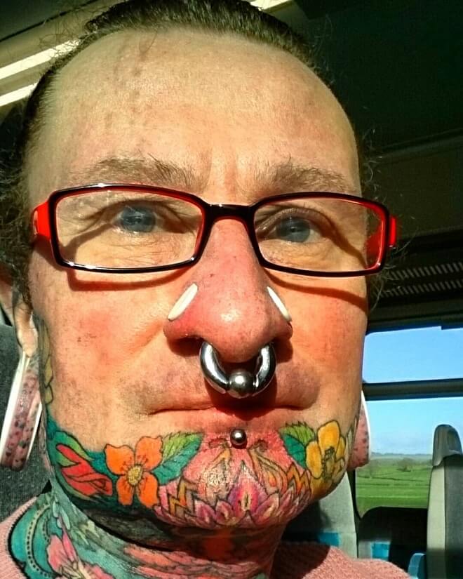 Stretched Nostril Face Tattoo