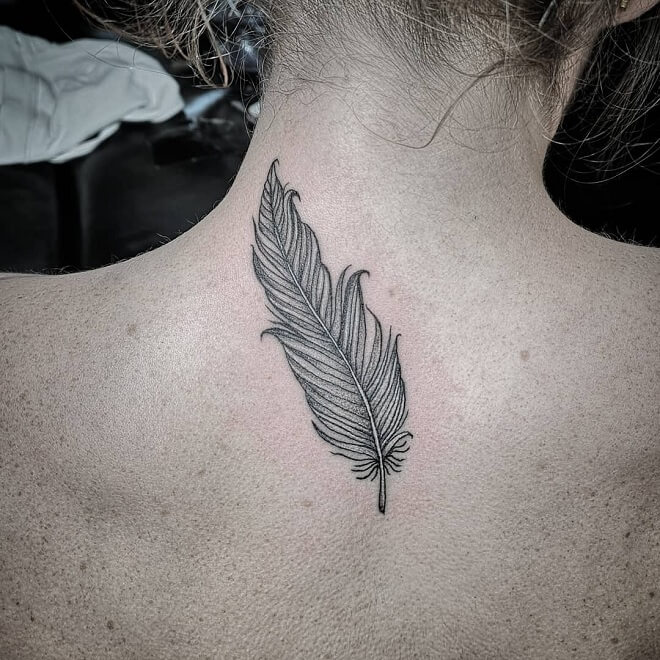 Back Side White Feather Tattoo