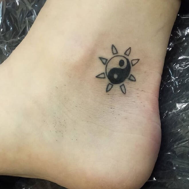 Black Art Sun Tattoo