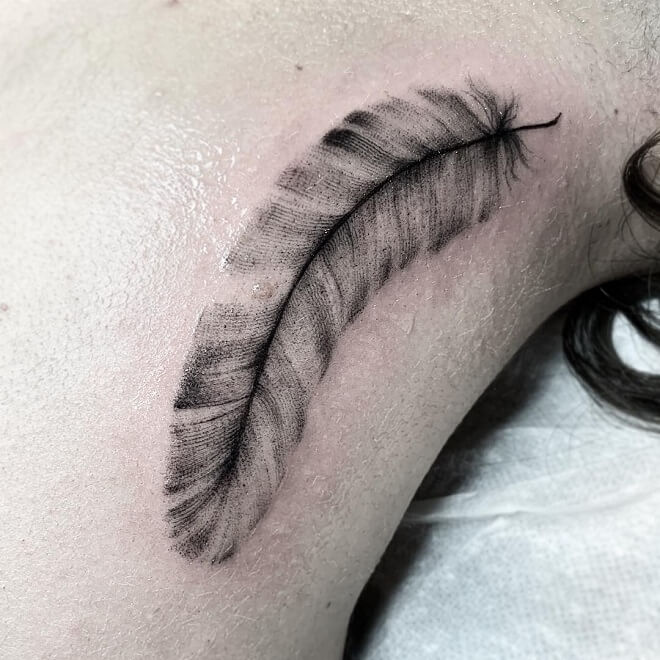Bold White Feather Tattoo