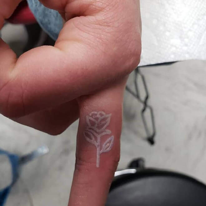Finger Rose White ink Tattoo