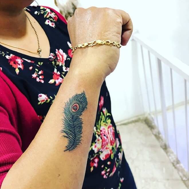 Incredible Peacock Feather Tattoo