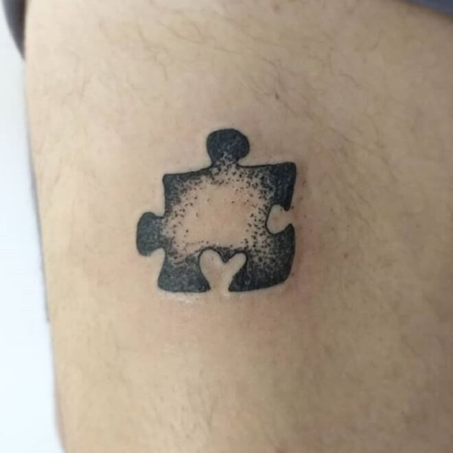 Dot Work Puzzle Piece Tattoo