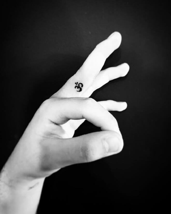 Finger Om Tattoo