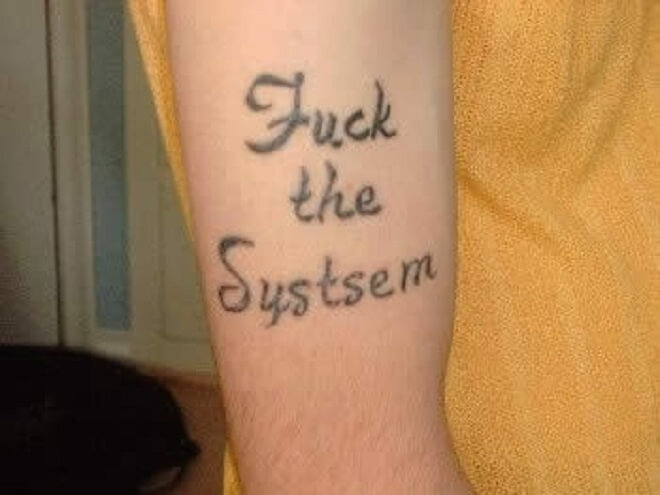 The Systsem is Broken Tattoo