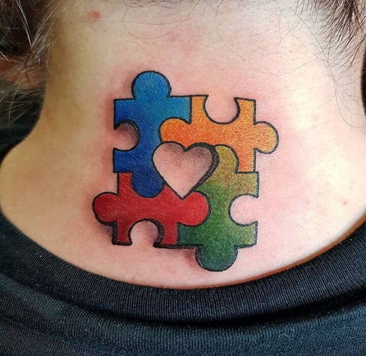 The puzzle piece tattoos are representative of autism. 