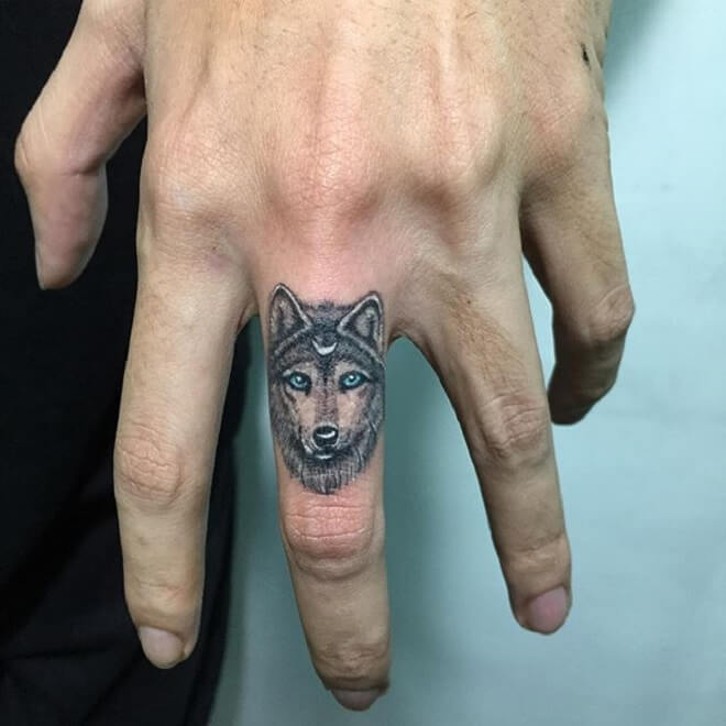 Wolf Finger Tattoo
