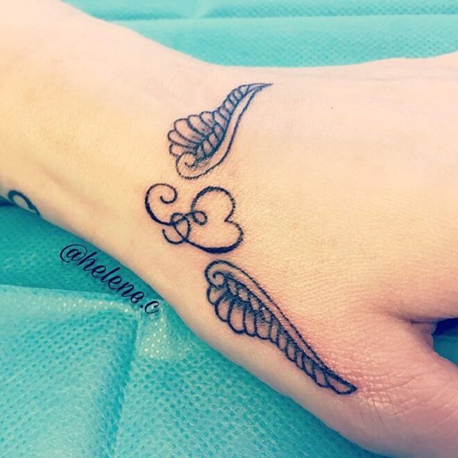 Amazing Heart with Wings Tattoo