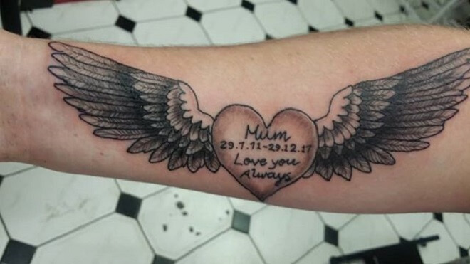 Black Heart with Wings Tattoo