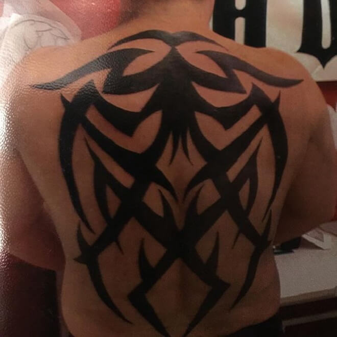 Black Upper Back Tattoo