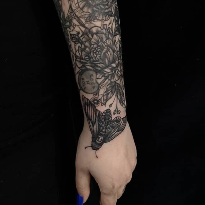 Hand Death Moth Tattoo