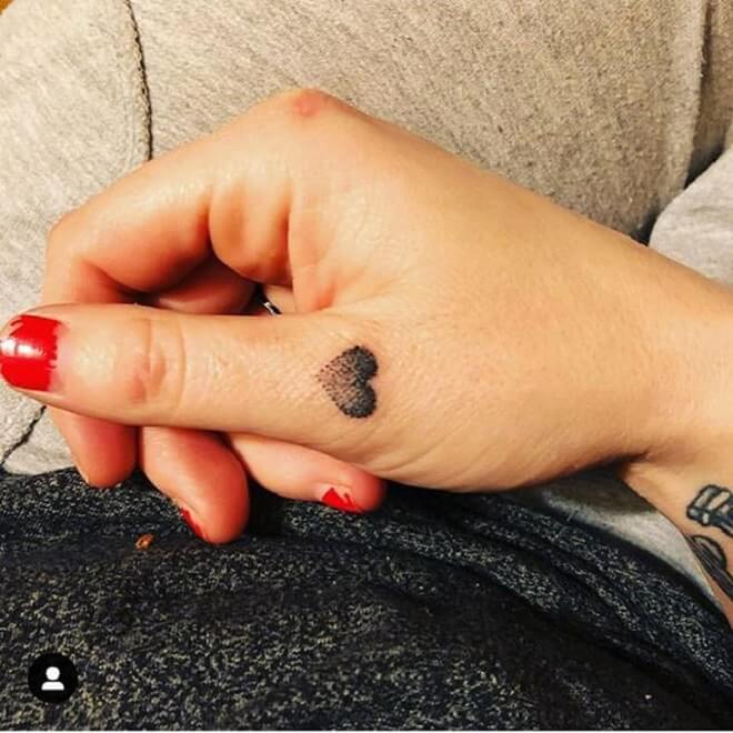 Heart Thumb Tattoo