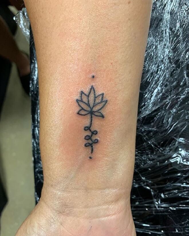 Small Black Flower Tattoo