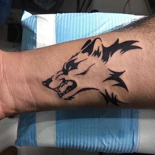 Awesome Tribal Wolf Tattoo