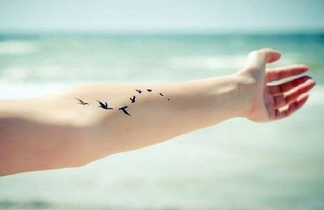Beautiful Flock of Birds Tattoo