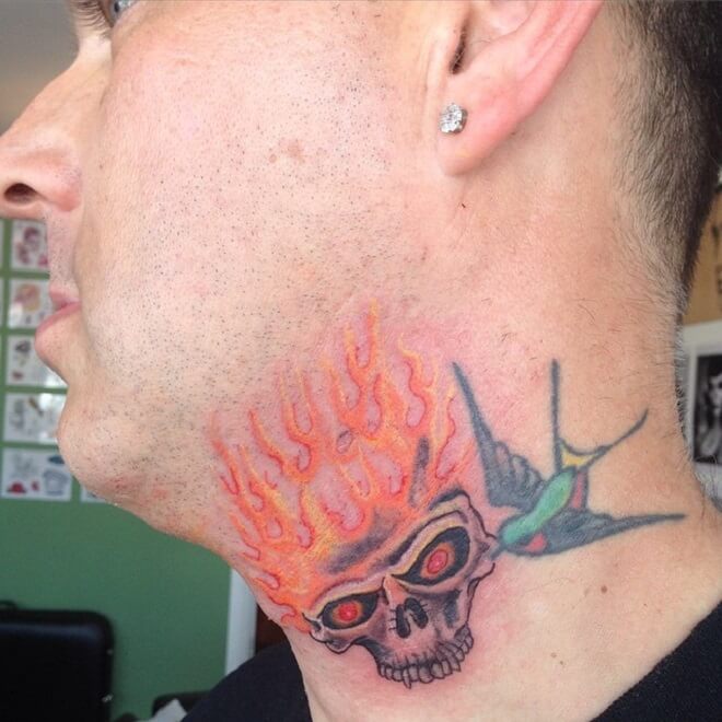 Bird Flaming Skull Tattoo