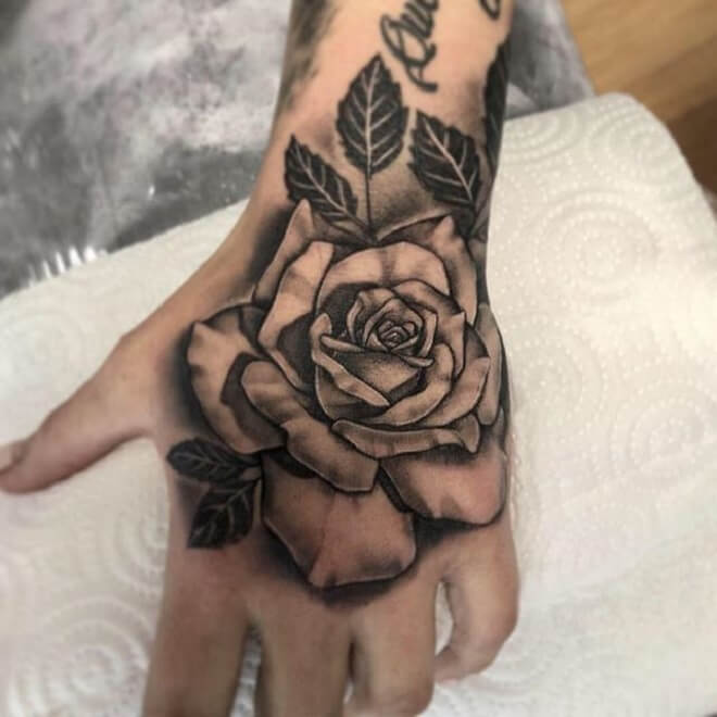 Black and Grey Rose Hand Tattoo