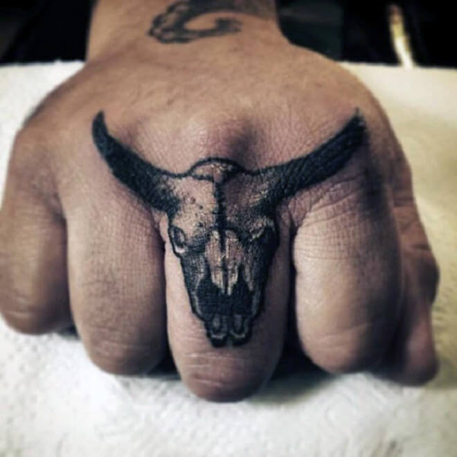 Finger Bull Skull Tattoo
