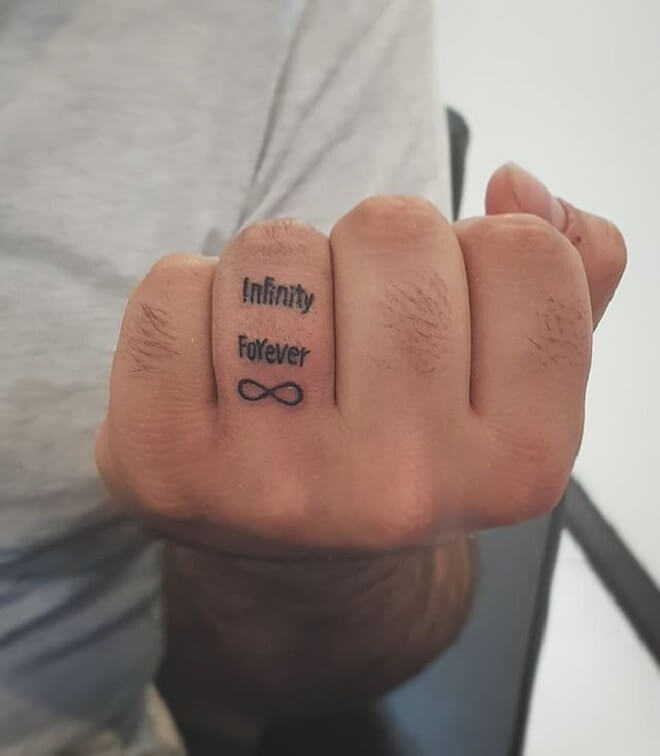 Finger Text Tattoo
