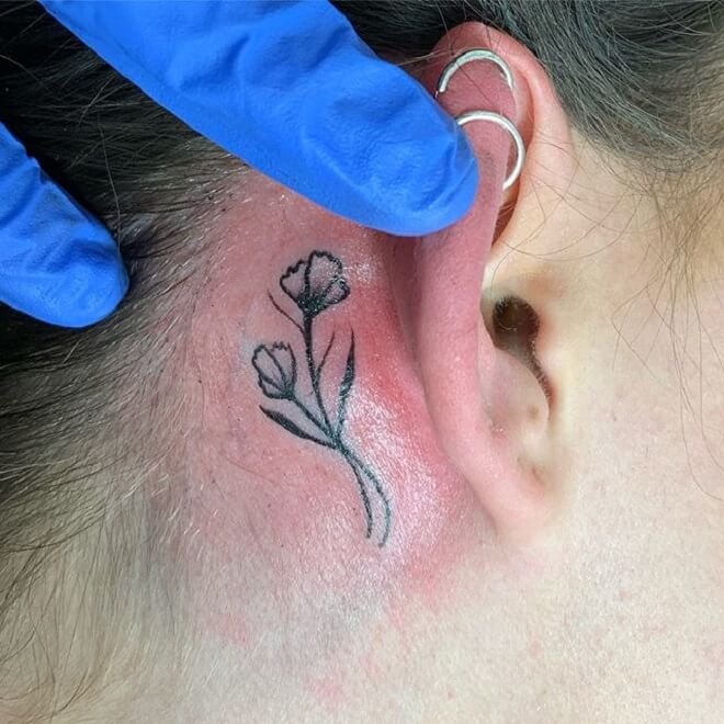 Flower Behind the Ear Tattoo