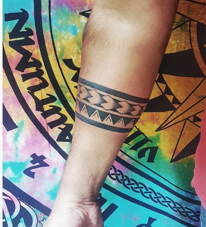 Forearm Tattoo with Tribal Design
