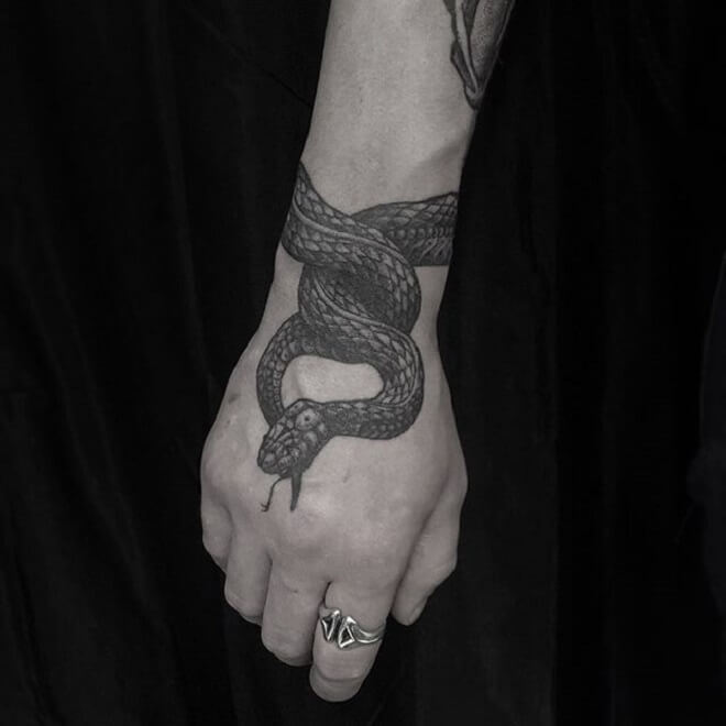Hand Ouroboros Tattoo