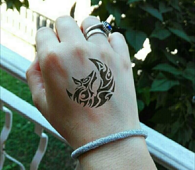 Hand Tribal Wolf Tattoo