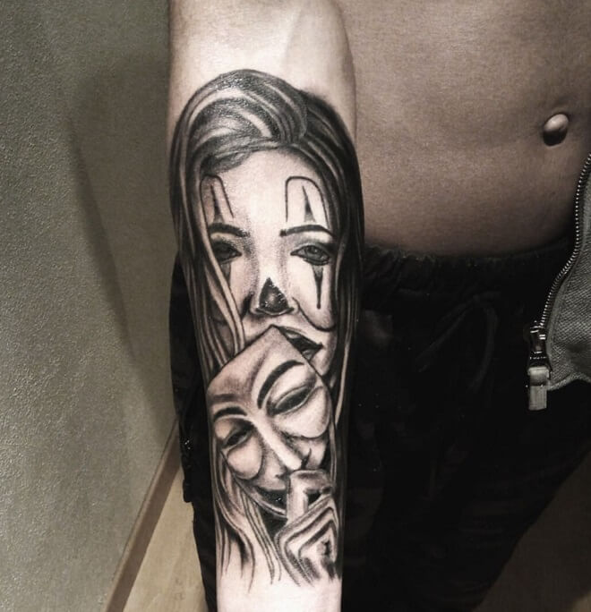 Joker with girl tattoo