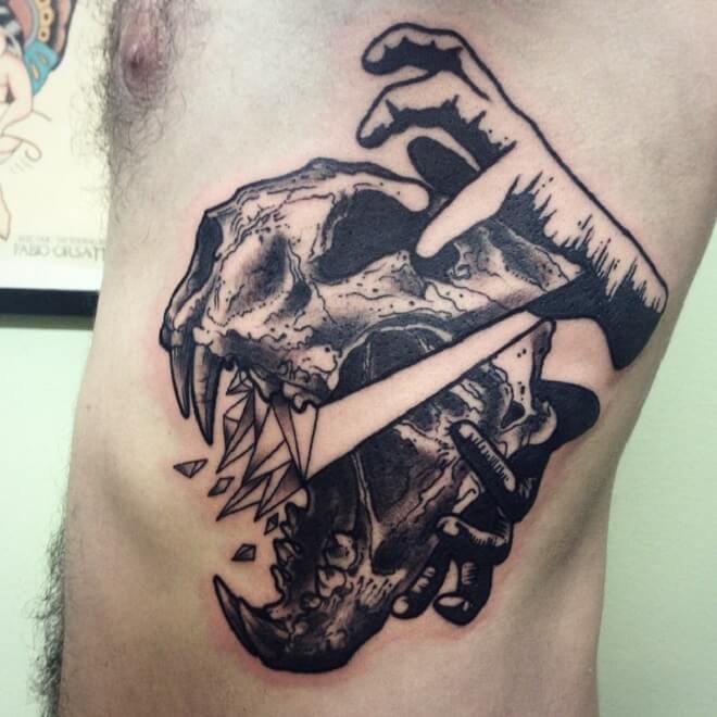 Lion Skull Hand Tattoo