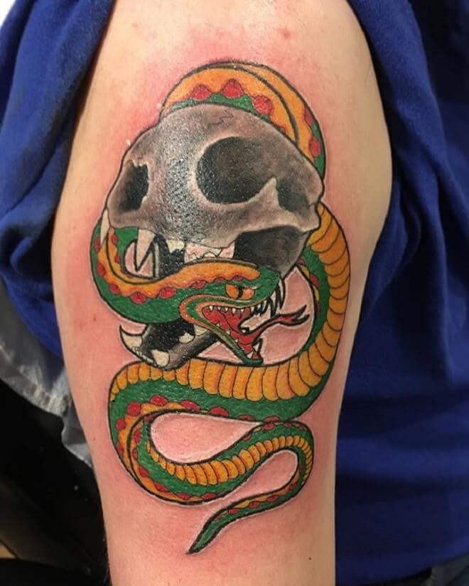 Lion Skull With Snake Tattoo