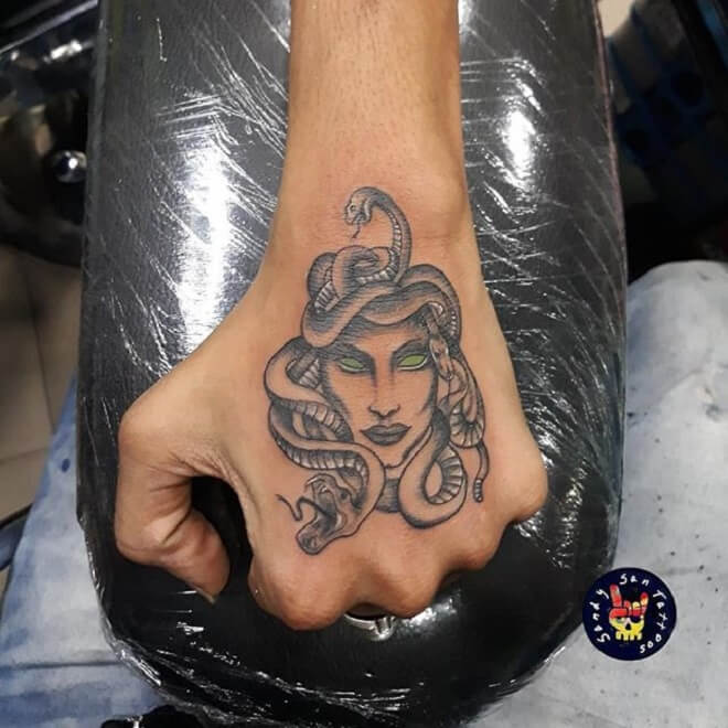 17. Medusa Hand Tattoo.