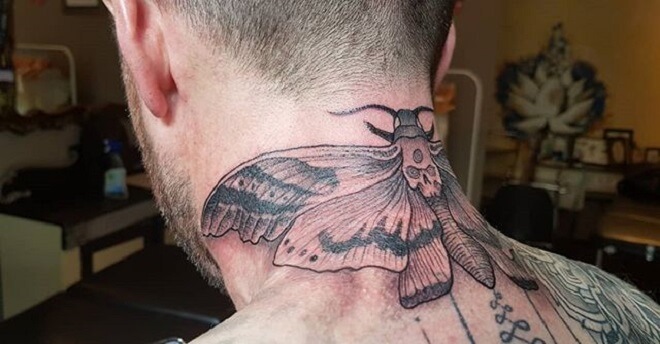 Moth Neck Tattoo