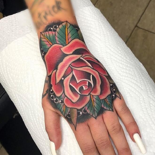 New Traditional Rose Hand Tattoo