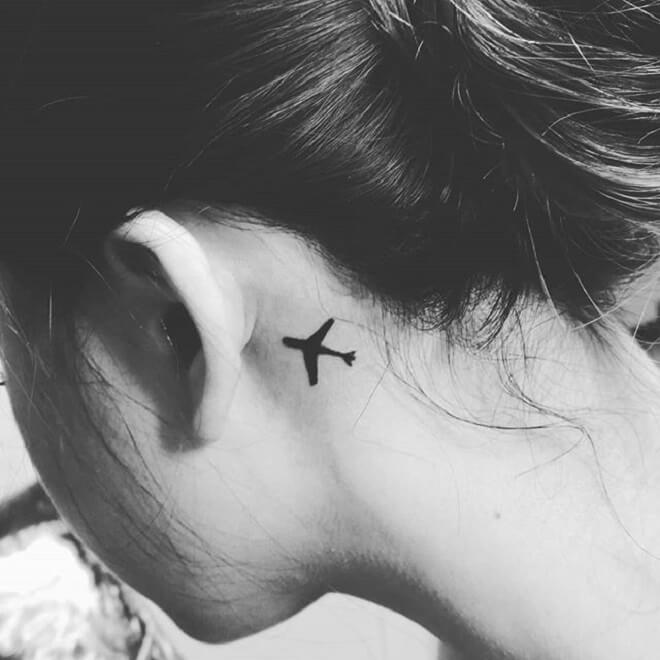 Plane Behind the Ear Tattoo
