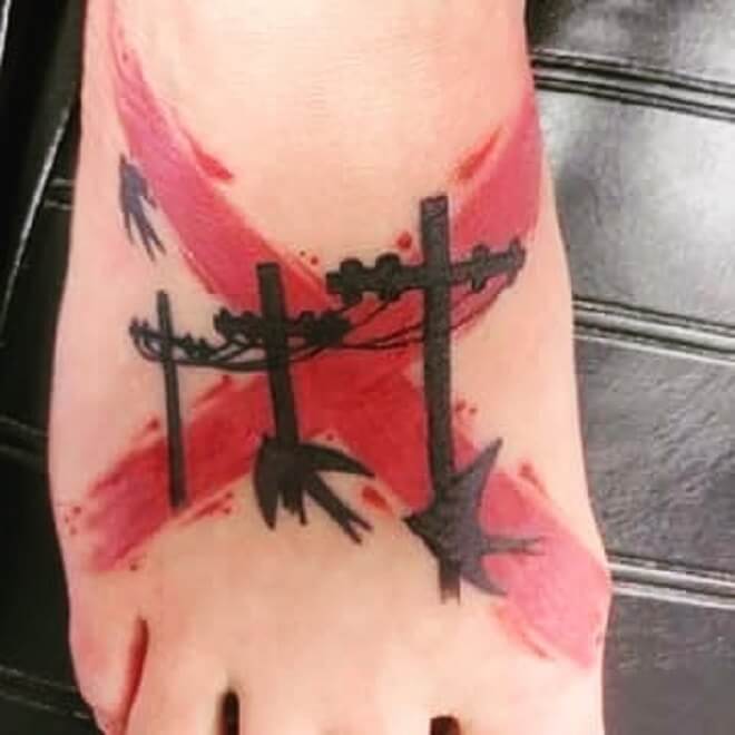 Red and Black Foot Tattoo