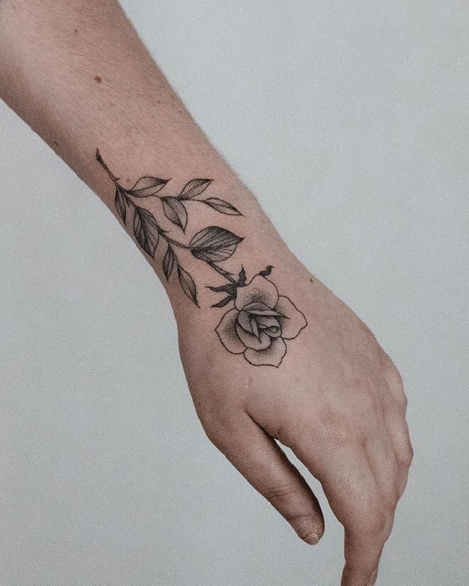 Rose Hand Tattoo Artist